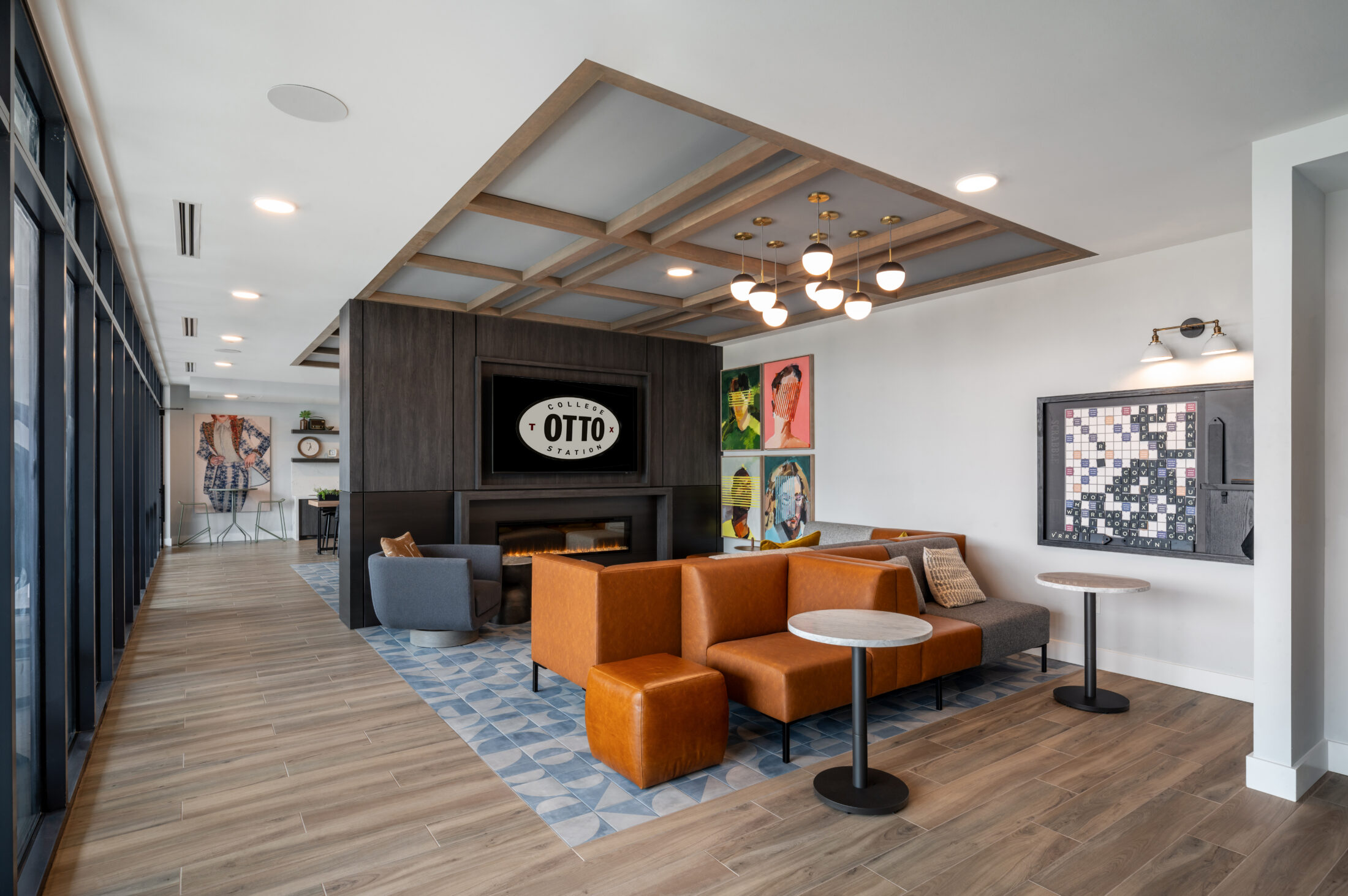 Otto Student Living near TAMU Campus: Lounge with Scrabbleboard and Modern Seating